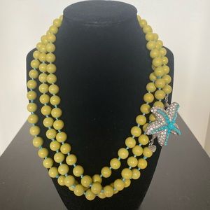 Stella and Dot Palm necklace with starfish detachable pin.